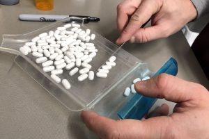 Pills are collected to fill a prescription