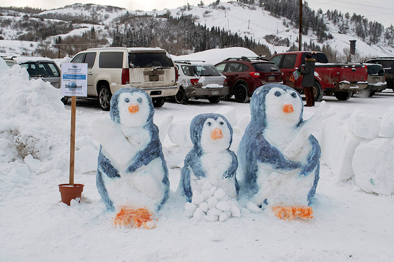 This is a photo of snow sculptures of penguins.