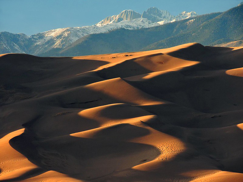 Great Sand Dunes National Park is great during all seasons. Here the dunes are in the foreground with snowy peaks in the background.