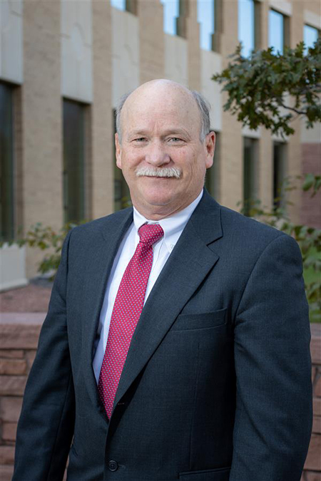 Profile shot of Dr. Kevin Lillehei, a neurosurgeon and an expert at removign tiny pituitary tumors that cause Cushing's disease.