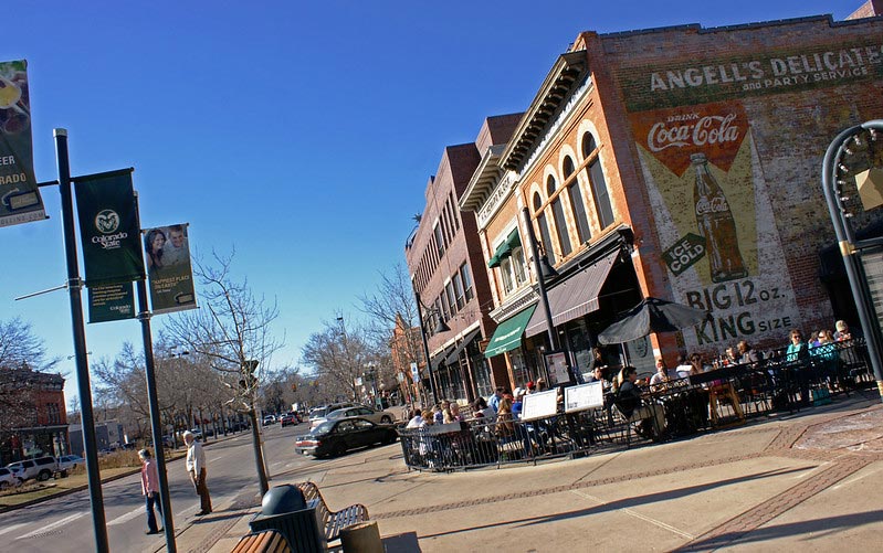 Old town with a ghost sign on the side of one building.
