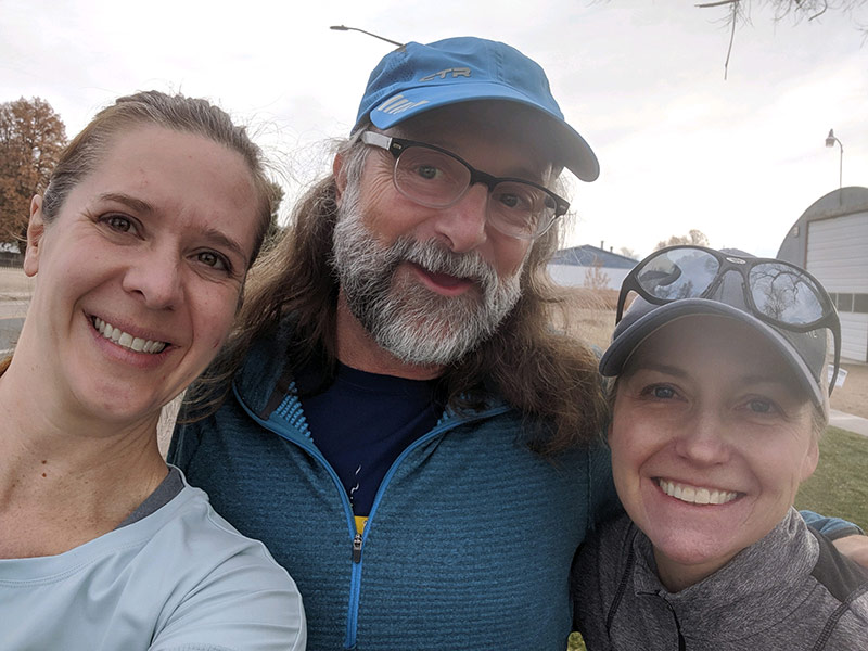 Jeff with his two therapists, who helped him with his hemorrhagic stroke treatment, after a Sunday run