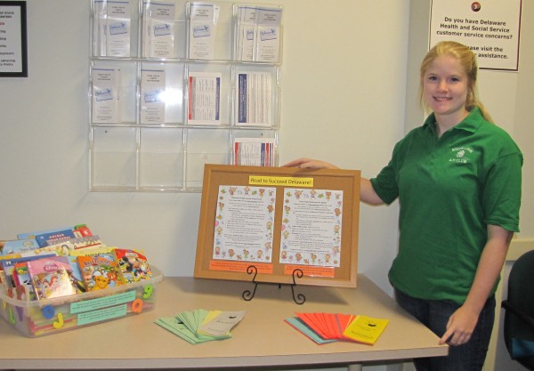 Sarah Bell sets up a literacy center in the Appoquinimink location