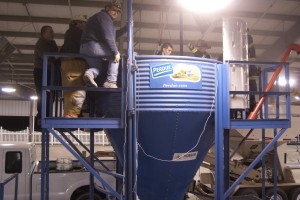 First responders practice rescuing a victim inside a silo