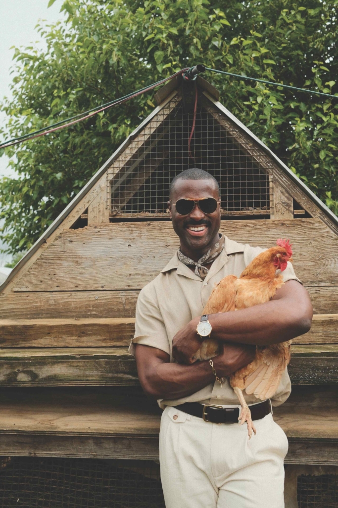 Georges Coupet holding a chicken