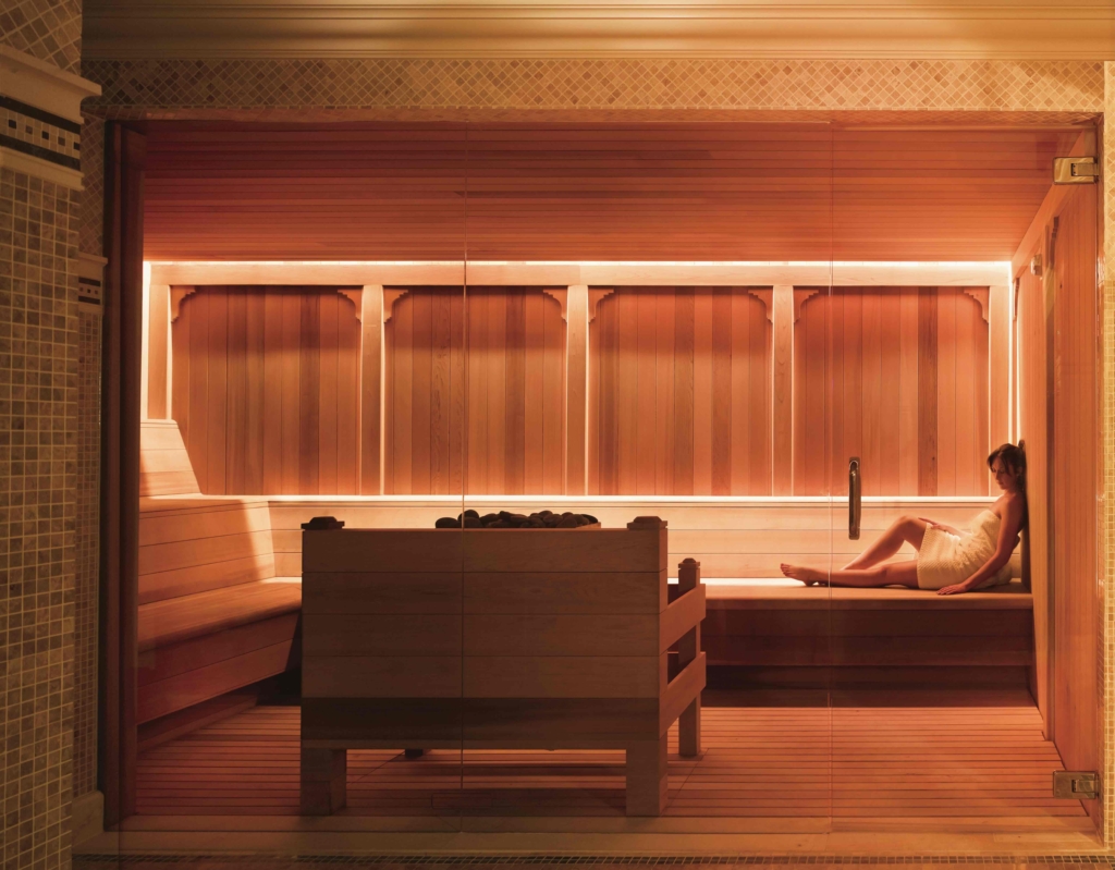 a women in a towel relaxing in a spa room