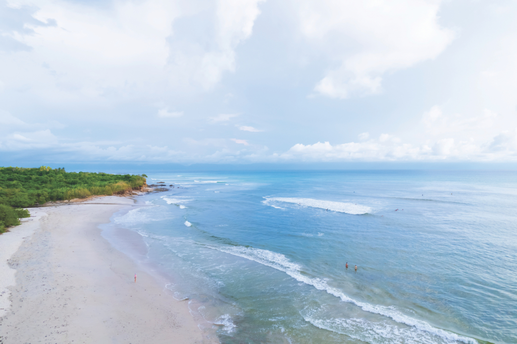 Cloudy blue sky above water