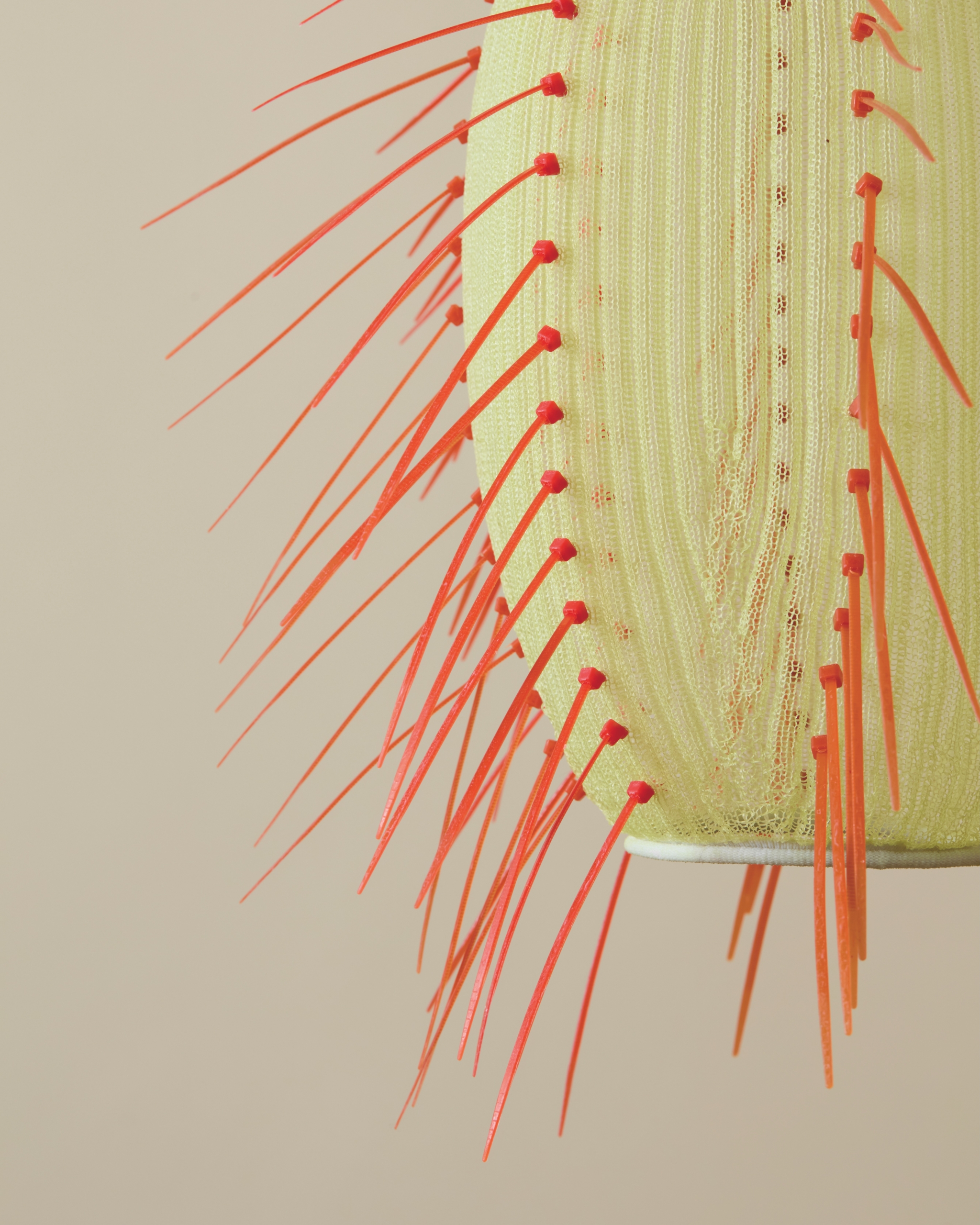 A woven pendant light