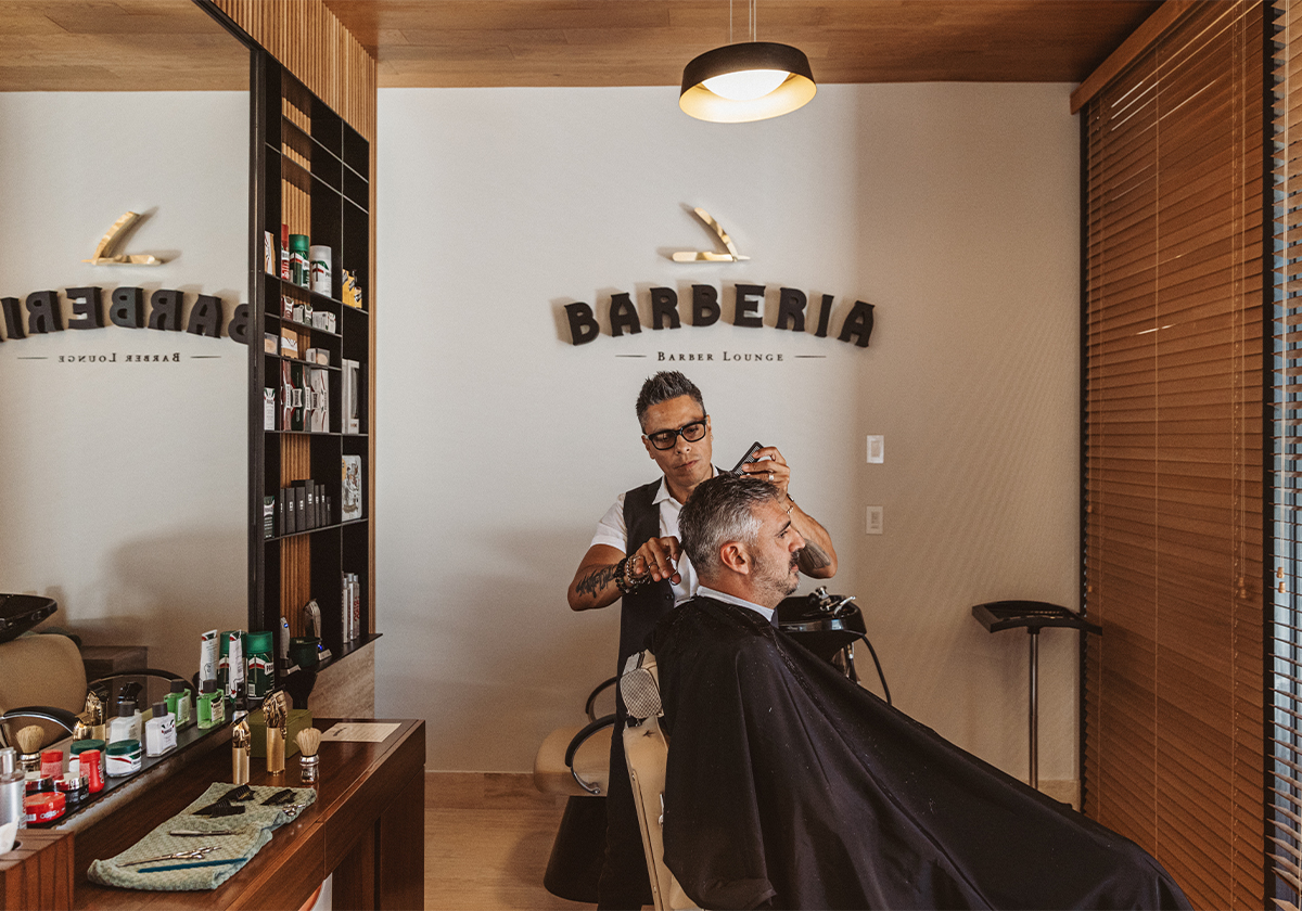 A guest getting a haircut at Barberia at Montage Los Cabos
