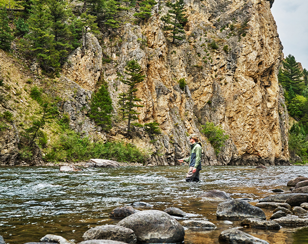 Man fly fishing in Big Sky