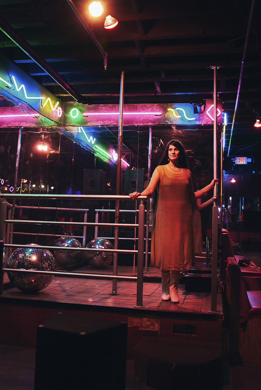 A woman dancing in a Baltimore venue