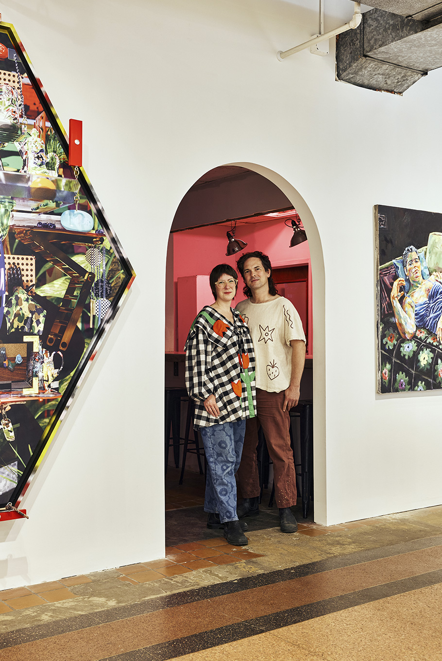 A artist couple in a Baltimore art gallery