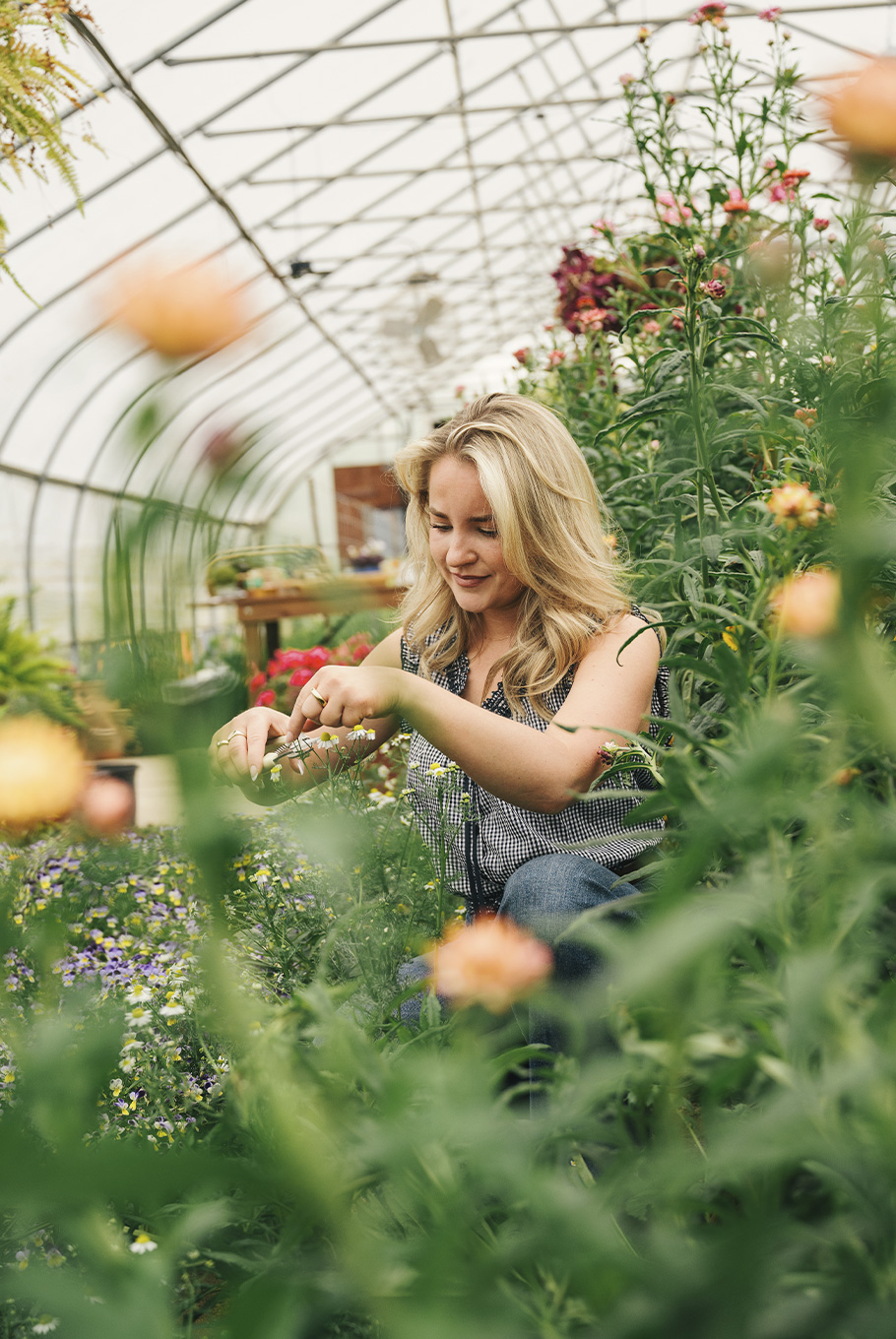 A woman gardening in the Pendry Natirar Farm