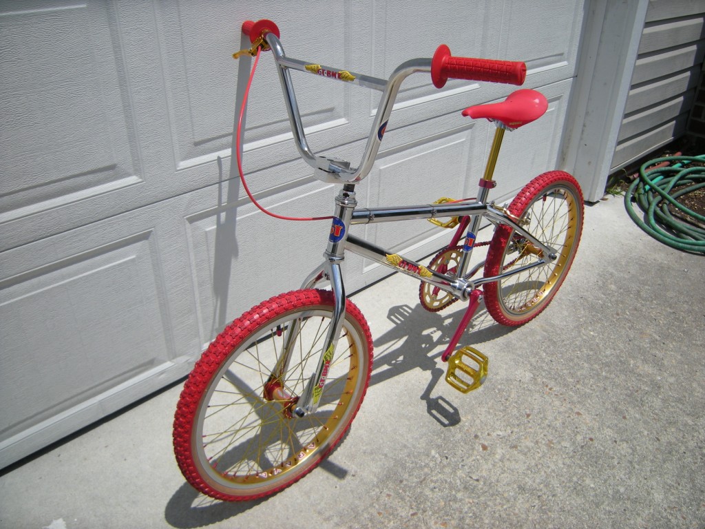 GOLD stem on RED headset on CHROME bike 