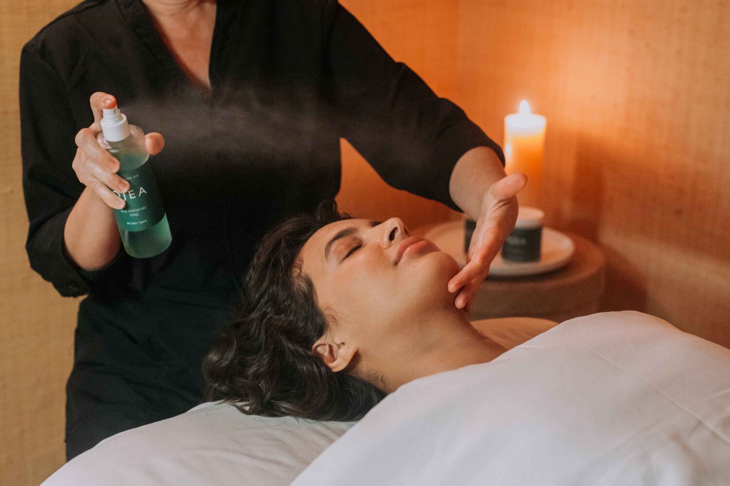 woman getting a facial at the spa