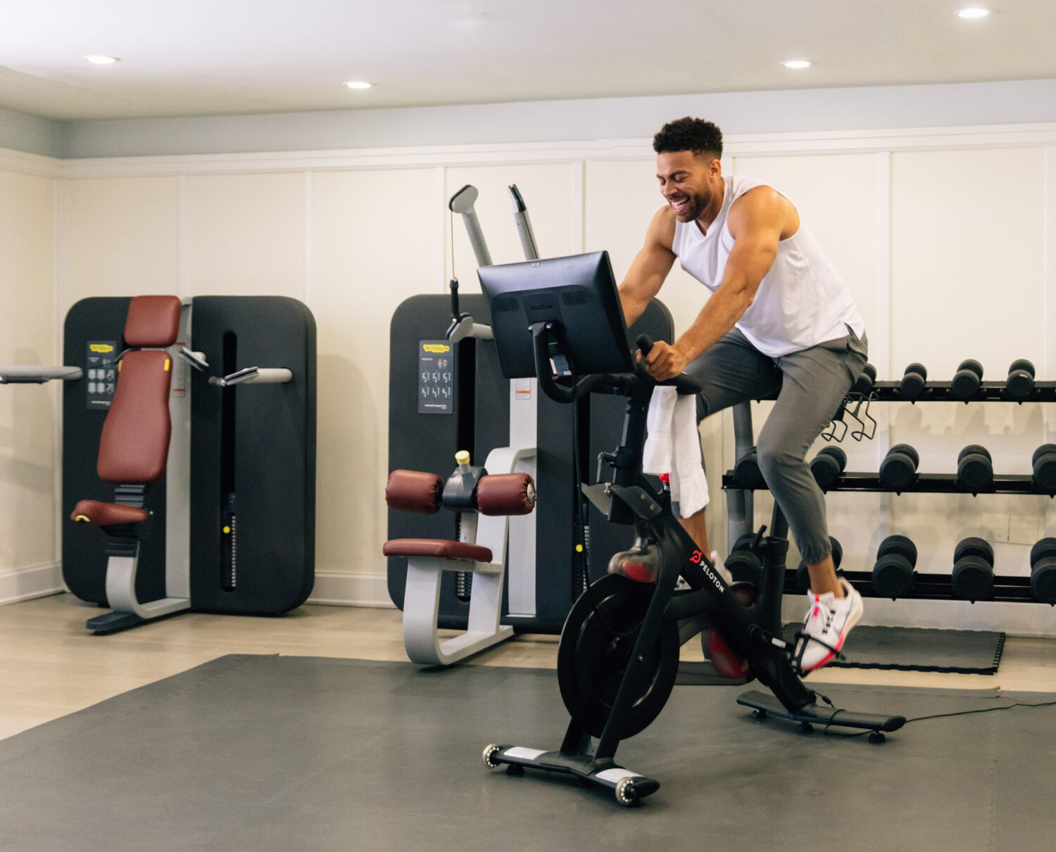 man on the peloton in the gym
