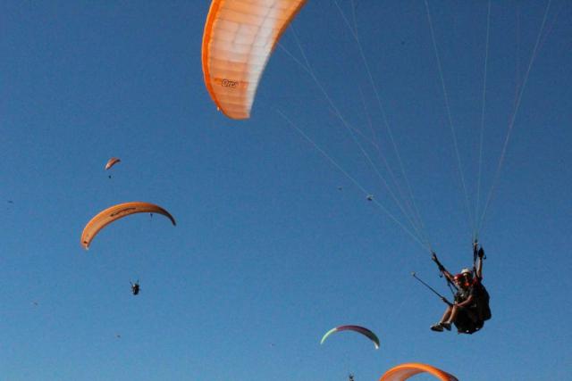Teens do paragliding adventure on summer youth travel program to Europe