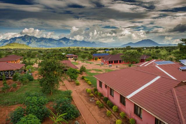 Students enjoy a beautiful campus at a school in Tanzania during their summer service and travel program.