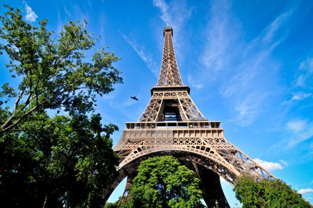 The Eiffel Tower in front of blue skies in Paris