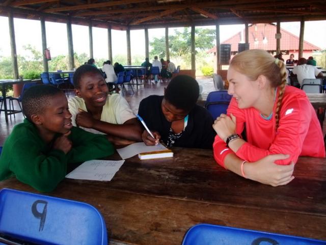 Teens spend time with local students on summer service and adventure program in Tanzania.
