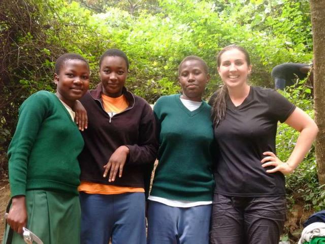 Teens go on a hike in Tanzania during their summer service program.
