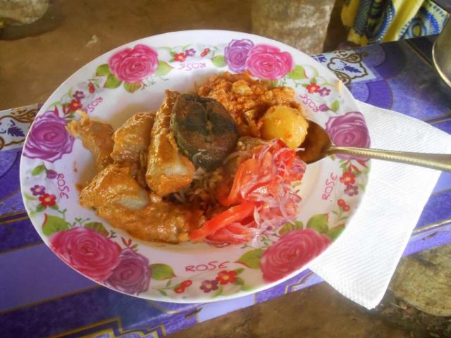 Teens enjoy local cuisine on their summer service tour of Tanzania.