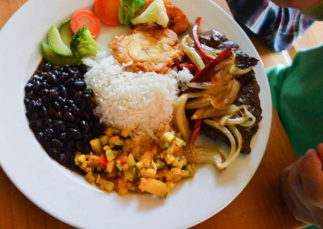 Students enjoy local cuisine on their summer teen tour of Costa Rica.