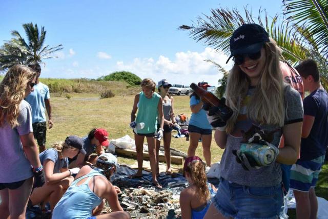 Teens do service projects in Hawaii on summer travel program.