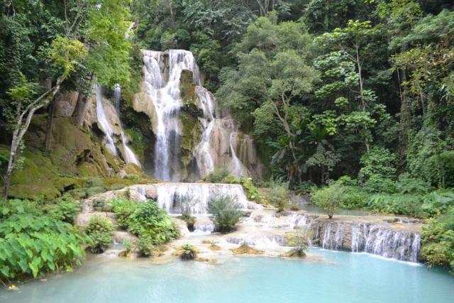 Waterfall seen by teenage travelers during summer youth program in Southeast Asia