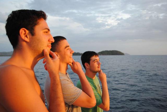 Teen boys enjoy the views on their summer adventure program in Costa Rica.