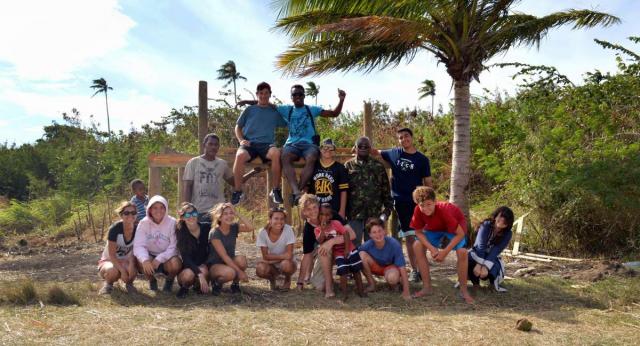 High school students pose for a photo on their summer teen tour to Fiji.