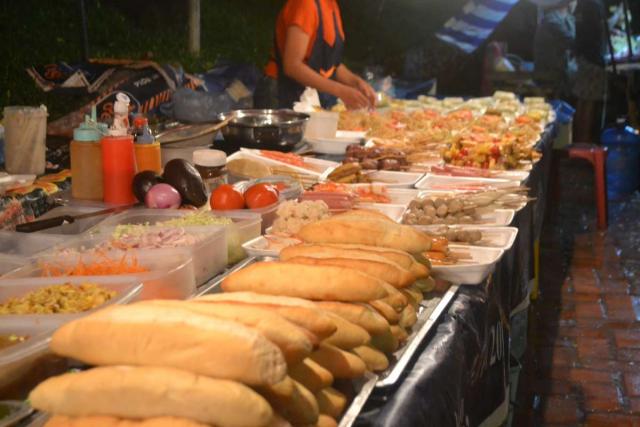 Local food sampled by teenage travelers during summer youth program in Southeast Asia