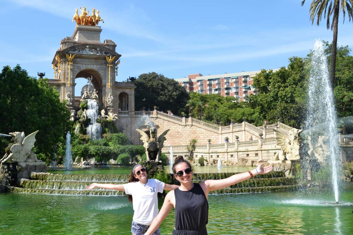 Teenage travelers in Barcelona park during summer Spanish language immersion program