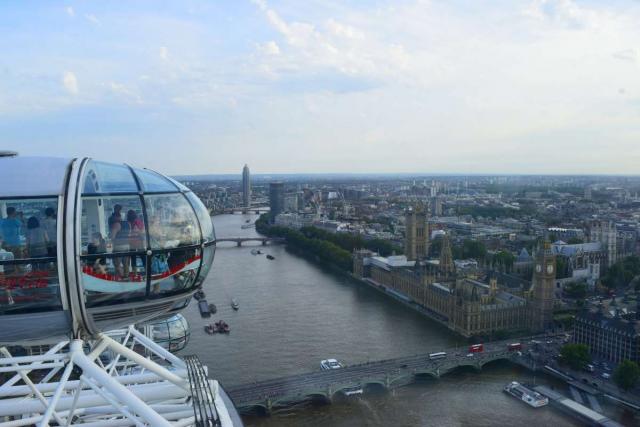 View of Parliament Big Ben and Thames from London Eye seen on summer teen travel tour