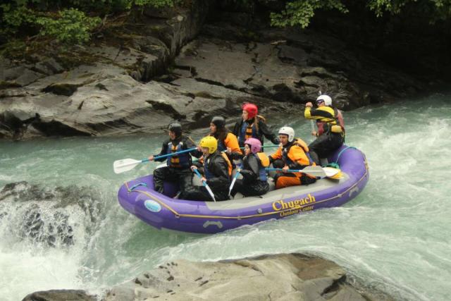 Teens go river rafting on their summer travel tour of Hawaii and Alaska.