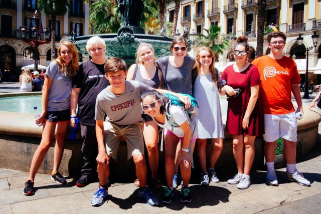 Teenage travelers in Barcelona Plaza Real during summer youth travel program