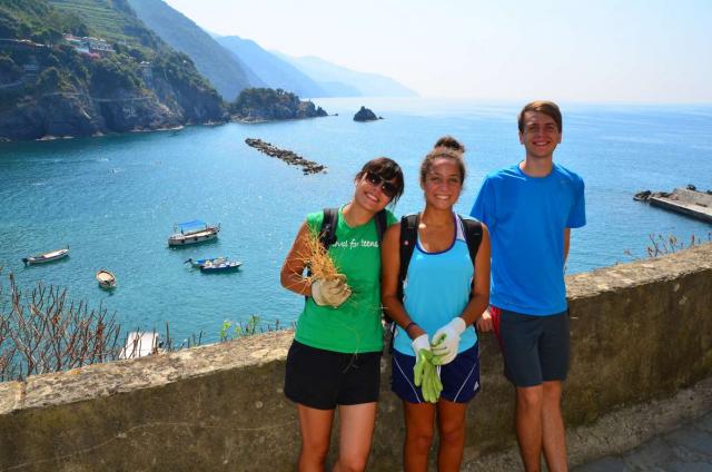 Teens smile along the Cinque Terre while taking in the Mediterranean vistas on their summer program to Italy.