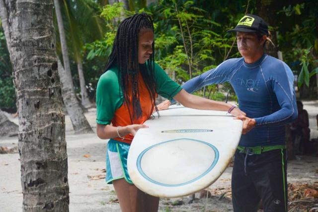 Student learns about surfing on her summer teen tour of Costa Rica.