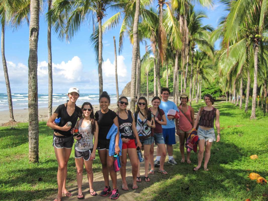 Teens take in the scenery of palm-lined beaches in Costa Rica on summer travel program.