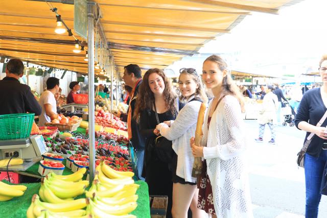Students at a Parisian farmers market