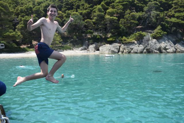 Boy Jumping Off Boat in Lefkada