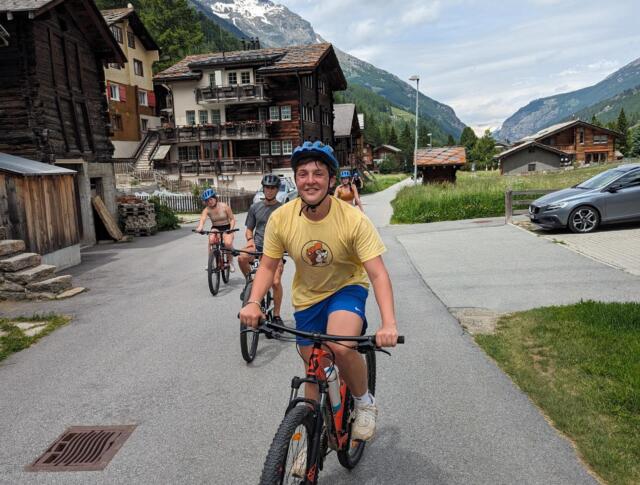 Teen biking in the Swiss Alps