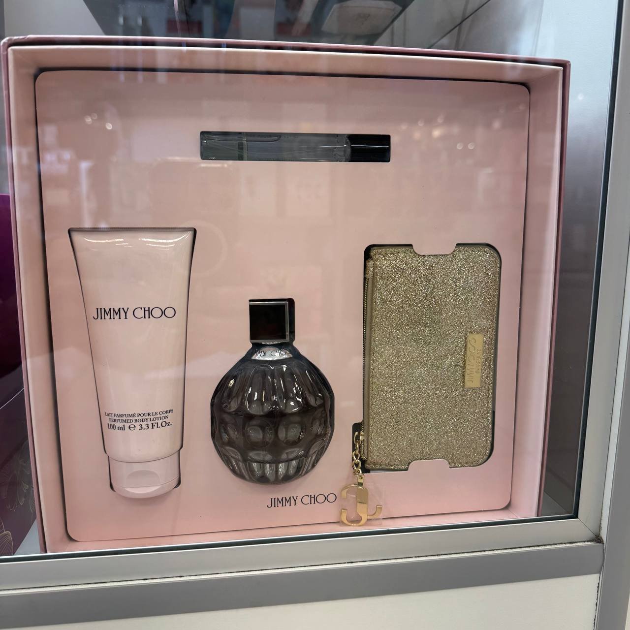 EDP 100 ml + EDP 7,5 ml + BODY LOTION 100ml + CARTEIRA JIMMY CHOO  557374