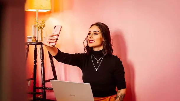female influencer taking a selfie