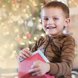 boy with Christmas toy
