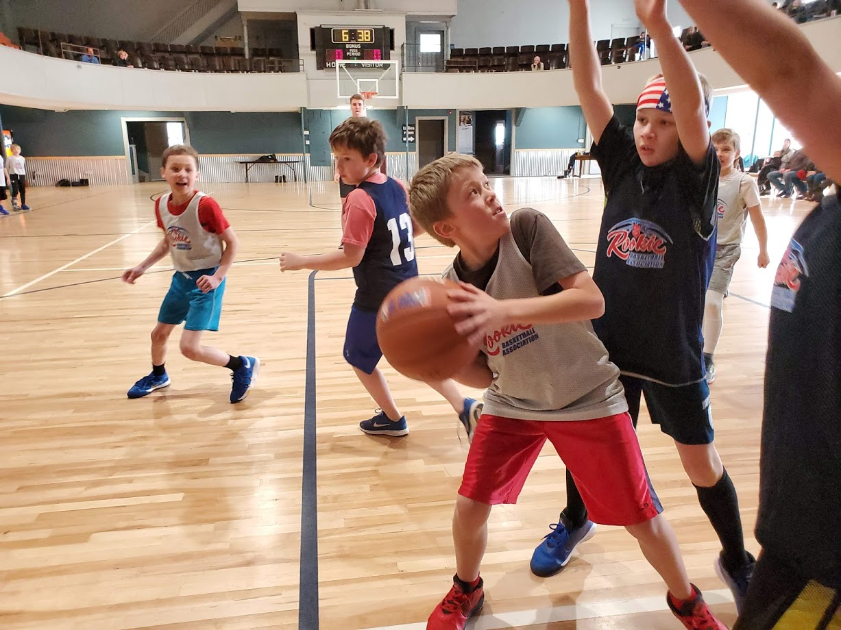 Boy about to shoot basketball