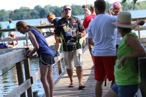 Racers fishing off the Lake Nokomis pier