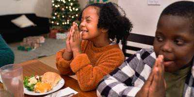 A family sharing food at the table