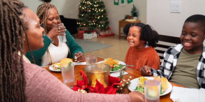 A family sharing food at the table
