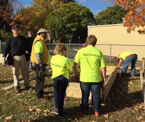 Volunteers Building Garden Beds